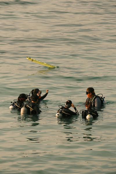 a group of scuba students in the water